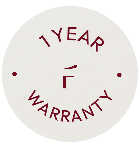 Circular badge with maroon text reading "1 YEAR WARRANTY" and two dots on either side, all on a light background.